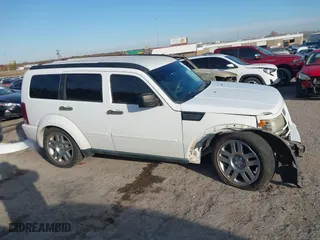 2011 Dodge Nitro Heat with VIN 1D4PT4GK0BW582589, listed as a IAAI auction lot 41015035 with 130,098 mi miles. Bid and sale history available at carsss.com. Image 14.