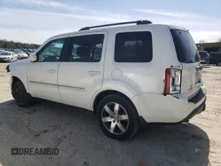 2012 Honda Pilot Touring with VIN 5FNYF4H97CB083346, listed as a Copart auction lot 48261855 with 127,723 mi miles and Salvage Title. Bid and sale history available at DreamBid. Image 2.