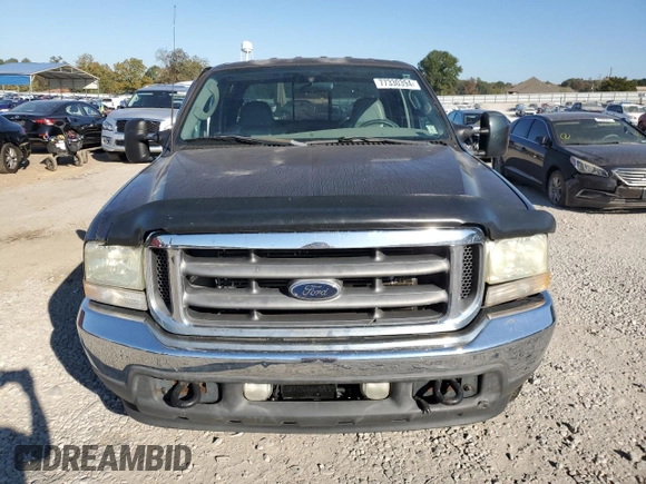 2003 Ford Super Duty F-250 XL with VIN 1FTNW20F73EB02536, listed as a Copart auction lot 77330394 with 170,102 mi miles and Salvage Title. Bid and sale history available at carsss.com. Image 5.