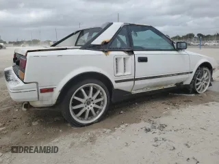 1986 Toyota MR2 z VIN JT2AW15C2G0049232, wystawiony jako Copart lot #47584895 z przebiegiem 185 369 mil mil oraz Tytuł czysty. Historia ofert i sprzedaży dostępna na DreamBid. Obrazek 3.