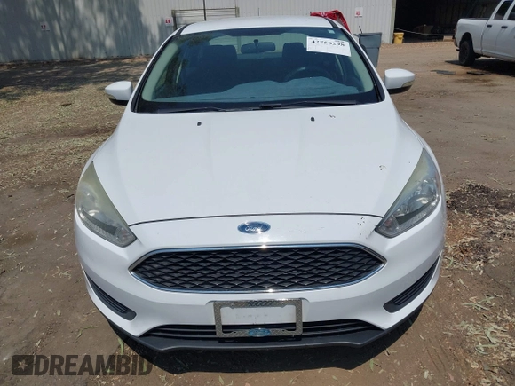 2016 Ford Focus SE z VIN 1FADP3F24GL268619, wystawiony jako IAAI lot #42750298 z przebiegiem 96 587 mil mil oraz . Historia ofert i sprzedaży dostępna na DreamBid. Obrazek 6.