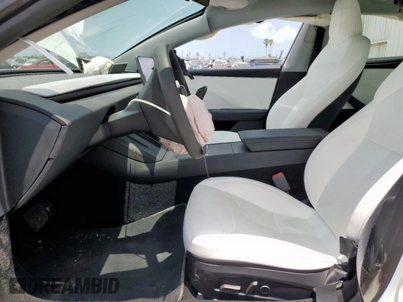 2025 Tesla Model 3 Long Range with VIN 5YJ3E1EB2SF882842, listed as a Copart auction lot 58424635 with 10,817 mi miles and Salvage title. Bid and sale history available at DreamBid. Image 7.