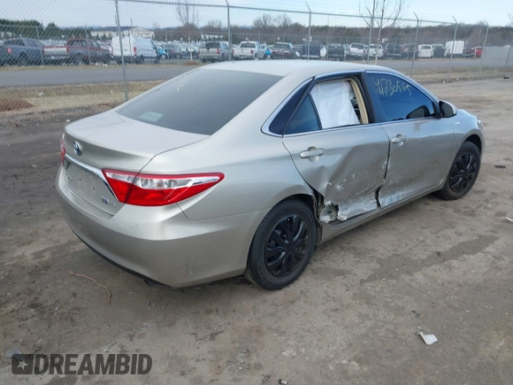 2017 Toyota Camry Hybrid LE with VIN 4T1BD1FK1HU213812, listed as a IAAI auction lot 41730565 with 67,706 mi miles. Bid and sale history available at carsss.com. Image 4.