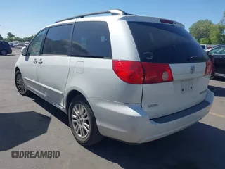 2010 Toyota Sienna XLE with VIN 5TDYK4CC3AS294129, listed as a IAAI auction lot 42510201 with 200,601 mi miles and . Bid and sale history available at DreamBid. Image 3.