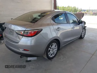 2016 Scion iA with VIN 3MYDLBZV4GY116855, listed as a IAAI auction lot 42163042 with 166,847 mi miles and . Bid and sale history available at DreamBid. Image 4.