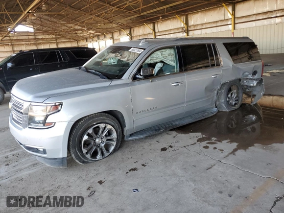 2018 Chevrolet Suburban Premier with VIN 1GNSCJKC7JR104888, listed as a Copart auction lot 68027604 with 69,632 mi miles and Salvage title. Bid and sale history available at DreamBid. Image 1.
