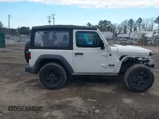 2021 Jeep Wrangler Sport S with VIN 1C4GJXAN6MW677281, listed as a IAAI auction lot 40814351 with 55,360 mi miles and . Bid and sale history available at DreamBid. Image 13.