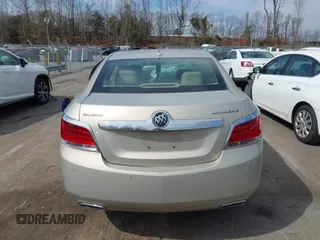 2012 Buick LaCrosse Premium 1 z VIN 1G4GD5E37CF149117, wystawiony jako IAAI lot #41791867 z przebiegiem 123 062 mil mil oraz . Historia ofert i sprzedaży dostępna na DreamBid. Obrazek 17.