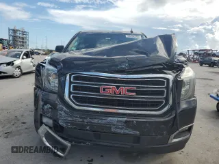 2019 GMC Yukon SLT with VIN 1GKS1BKC1KR155426, listed as a Copart auction lot 69498504 with 161,387 mi miles and Salvage Title. Bid and sale history available at carsss.com. Image 5.