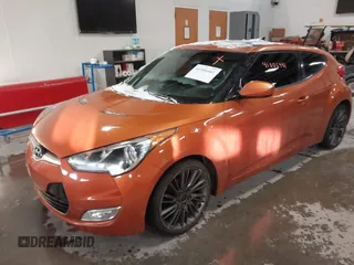 2012 Hyundai Veloster w/Gray Int z VIN KMHTC6AD6CU076954, wystawiony jako IAAI lot #41006441 z przebiegiem 73 767 mil mil oraz . Historia ofert i sprzedaży dostępna na DreamBid. Obrazek 2.