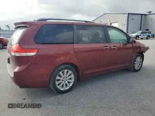 2011 Toyota Sienna XLE with VIN 5TDDK3DCXBS024257, listed as a Copart auction lot 60667145 with 283,609 mi miles and Salvage title. Bid and sale history available at DreamBid. Image 3.