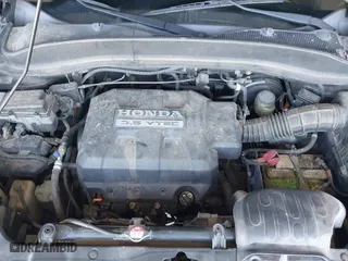 2006 Honda Ridgeline RTL with VIN 2HJYK16556H566886, listed as a IAAI auction lot 42077035 with 124,310 mi miles. Bid and sale history available at carsss.com. Image 10.