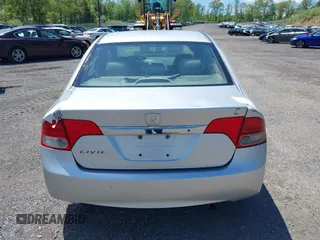 2009 Honda Civic DX-VP z VIN 2HGFA16399H349229, wystawiony jako IAAI lot #41749953 z przebiegiem 201 533 mil mil oraz . Historia ofert i sprzedaży dostępna na DreamBid. Obrazek 17.