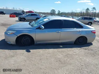 2015 Toyota Camry XLE with VIN 4T4BF1FK1FR448062, listed as a IAAI auction lot 41882344 with 121,490 mi miles. Bid and sale history available at carsss.com. Image 14.