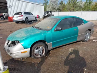 2003 Pontiac Sunfire with VIN 1G2JB12F237312035, listed as a IAAI auction lot 41727230 with 165,534 mi miles. Bid and sale history available at carsss.com. Image 2.