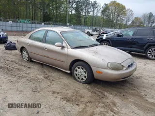 1999 Mercury Sable GS with VIN 1MEFM50U4XG601278, listed as a IAAI auction lot 41940748 with 1 mi miles. Bid and sale history available at carsss.com. Image 1.