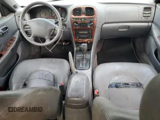 2001 Hyundai Sonata GLS with VIN KMHWF35VX1A372516, listed as a Copart auction lot 76357494 with 170,642 mi miles and Salvage Title. Bid and sale history available at carsss.com. Image 8.