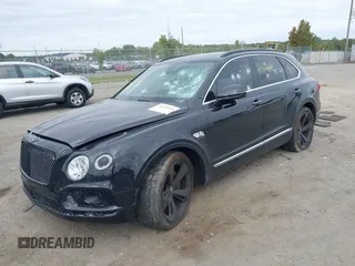 2018 Bentley Bentayga Signature z VIN SJAAC2ZV8JC017393, wystawiony jako IAAI lot #40349518 z przebiegiem 71 203 mil mil oraz . Historia ofert i sprzedaży dostępna na DreamBid. Obrazek 2.
