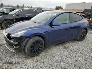 2021 Tesla Model Y Long Range with VIN 5YJYGDEEXMF213376, listed as a Copart auction lot 39659674 with 76,110 mi miles and Salvage Title. Bid and sale history available at DreamBid. Image 1.