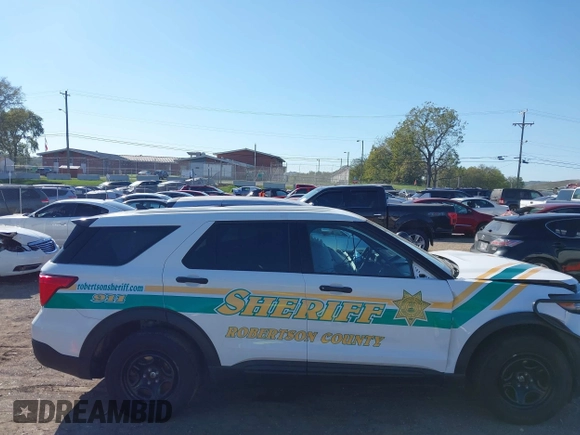 2022 Ford Police Interceptor Utility z VIN 1FM5K8AB2NGA02664, wystawiony jako IAAI lot #40499840 z przebiegiem 7 067 mil mil oraz . Historia ofert i sprzedaży dostępna na DreamBid. Obrazek 13.