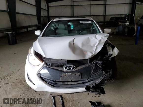 2014 Hyundai Elantra Coupe with VIN KMHDH6AH2EU026158, listed as a Copart auction lot 68703794 with 99,404 mi miles and Salvage Title. Bid and sale history available at carsss.com. Image 5.