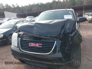 2012 GMC Yukon SLT with VIN 1GKS1CE06CR104447, listed as a IAAI auction lot 41589823 with 183,003 mi miles. Bid and sale history available at carsss.com. Image 6.