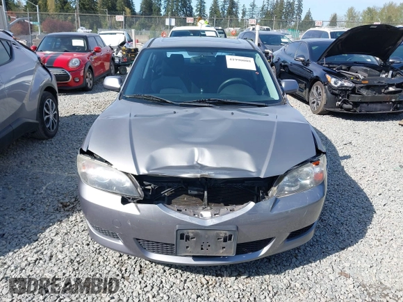 2006 Mazda 3 i with VIN JM1BK12F461530369, listed as a IAAI auction lot 41990008 with 169,878 mi miles. Bid and sale history available at carsss.com. Image 12.