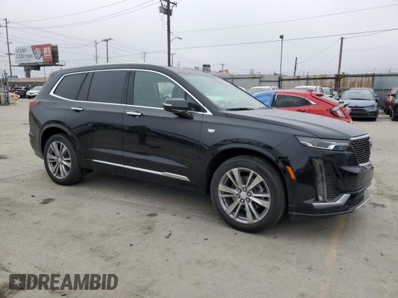 2023 Cadillac XT6 FWD Premium Luxury z VIN 1GYKPCRS5PZ119186, wystawiony jako Copart lot #50577175 z przebiegiem 32 189 mil mil oraz Szkoda całkowita • Salvage title. Historia ofert i sprzedaży dostępna na DreamBid. Obrazek 4.