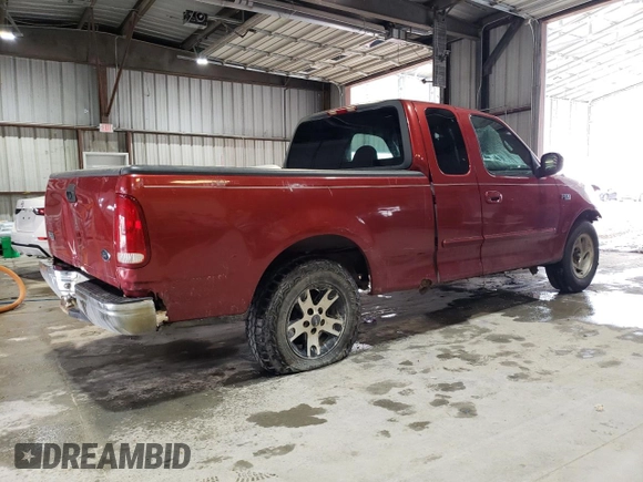 2000 Ford F-150 XL with VIN 1FTZX1720YKB22051, listed as a Copart auction lot 88255005 with 243,759 mi miles and Salvage Title. Bid and sale history available at carsss.com. Image 3.