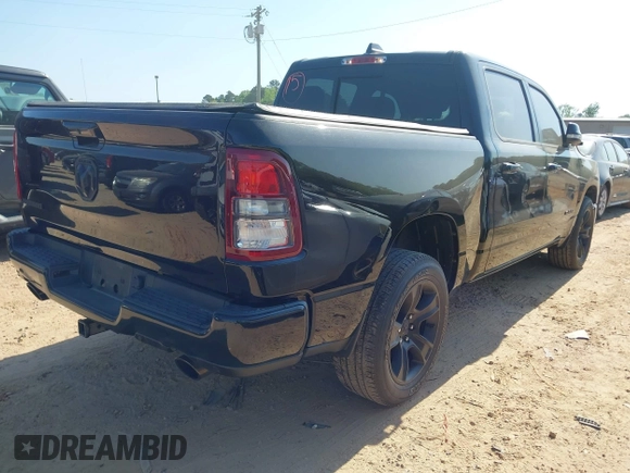 2021 Ram 1500 Big Horn z VIN 1C6RREFT1MN769814, wystawiony jako IAAI lot #42052424 z przebiegiem 71 958 mil mil oraz . Historia ofert i sprzedaży dostępna na DreamBid. Obrazek 4.