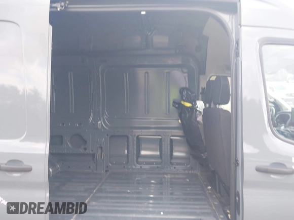 2023 Ford Transit Cargo with VIN 1FTBR3U88PKB86644, listed as a IAAI auction lot 41089106 with 8,095 mi miles and . Bid and sale history available at DreamBid. Image 8.