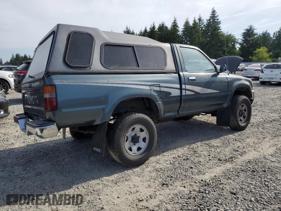1993 Toyota Pickup DX z VIN JT4RN01P3P7060439, wystawiony jako Copart lot #57356125 z przebiegiem 259 773 mil mil oraz Szkoda całkowita • Salvage title. Historia ofert i sprzedaży dostępna na DreamBid. Obrazek 3.