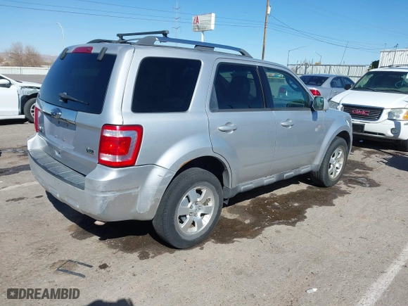 2010 Ford Escape Limited with VIN 1FMCU9EG8AKB12610, listed as a IAAI auction lot 41834872 with 214,218 mi miles. Bid and sale history available at carsss.com. Image 4.
