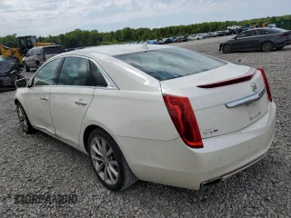 2013 Cadillac XTS Luxury with VIN 2G61P5S33D9125769, listed as a Copart auction lot 59671015 with 143,583 mi miles and Salvage title. Bid and sale history available at DreamBid. Image 2.