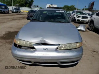2004 Oldsmobile Alero GL1 z VIN 1G3NL52E04C146972, wystawiony jako Copart lot #55977625 z przebiegiem 328 337 mil mil oraz Szkoda całkowita • Salvage title. Historia ofert i sprzedaży dostępna na DreamBid. Obrazek 5.