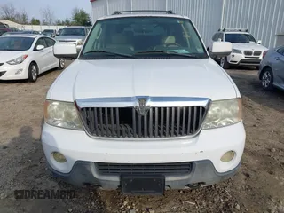 2004 Lincoln Navigator Luxury with VIN 5LMFU27R84LJ33410, listed as a IAAI auction lot 41530053 with 212,483 mi miles. Bid and sale history available at carsss.com. Image 6.