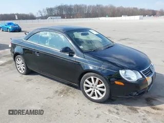 2008 Volkswagen Eos Turbo z VIN WVWBA71F88V048376, wystawiony jako IAAI lot #41693649 z przebiegiem 147 224 mil mil oraz . Historia ofert i sprzedaży dostępna na DreamBid. Obrazek 1.