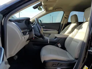 2019 Cadillac XT4 FWD Luxury z VIN 1GYAZAR42KF116087, wystawiony jako Copart lot #50231165 z przebiegiem 69 091 mil mil oraz Szkoda całkowita • Salvage title. Historia ofert i sprzedaży dostępna na DreamBid. Obrazek 7.