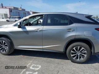 2022 Lexus RX with VIN 2T2AZMAAXNC228573, listed as a IAAI auction lot 41976051 with 22,784 mi miles. Bid and sale history available at carsss.com. Image 14.
