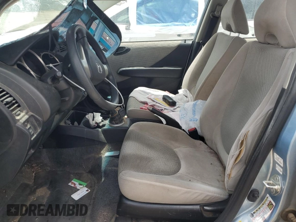 2007 Honda Fit with VIN JHMGD37477S061629, listed as a Copart auction lot 60435605 with 89,193 mi miles and Clean title. Bid and sale history available at DreamBid. Image 7.