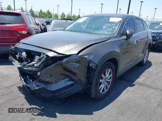 2017 Mazda CX-9 Touring with VIN JM3TCBCY1H0131233, listed as a IAAI auction lot 42490137 with 84,216 mi miles and . Bid and sale history available at DreamBid. Image 17.