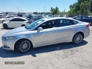 2016 Ford Fusion SE with VIN 3FA6P0T90GR374060, listed as a IAAI auction lot 42037332 with 145,676 mi miles. Bid and sale history available at carsss.com. Image 13.