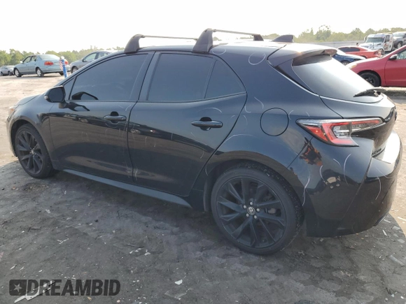 2021 Toyota Corolla Hatchback SE with VIN JTND4MBE7M3135630, listed as a Copart auction lot 64594624 with 63,106 mi miles and Salvage Title. Bid and sale history available at carsss.com. Image 2.
