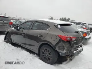 2014 Mazda 3 i Grand Touring with VIN JM1BM1M78E1102724, listed as a Copart auction lot 84099614 with 113,867 mi miles and Salvage Title. Bid and sale history available at DreamBid. Image 2.