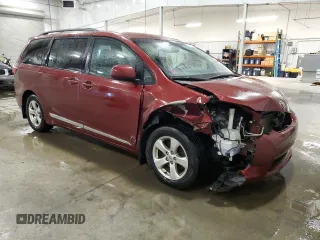 2015 Toyota Sienna LE AAS с VIN 5TDKK3DC2FS677288, выставлен на аукционе Copart как лот 57882845 с пробегом 162 458 миль миль и Списание • Salvage title. История ставок и продаж доступна на DreamBid. Изображение 4.