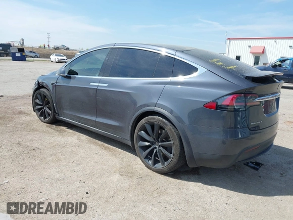 2017 Tesla Model X 90D with VIN 5YJXCBE22HF079194, listed as a IAAI auction lot 41895591 with 102,437 mi miles and . Bid and sale history available at DreamBid. Image 3.