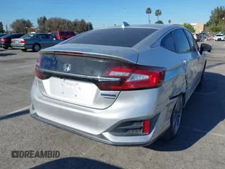 2019 Honda Clarity Touring z VIN JHMZC5F38KC003399, wystawiony jako IAAI lot #41818175 z przebiegiem 54 896 mil mil oraz . Historia ofert i sprzedaży dostępna na DreamBid. Obrazek 4.