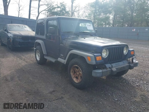 2005 Jeep Wrangler Sport z VIN 1J4FA49S25P302627, wystawiony jako IAAI lot #42100601 z przebiegiem 169 650 mil mil oraz . Historia ofert i sprzedaży dostępna na DreamBid. Obrazek 1.