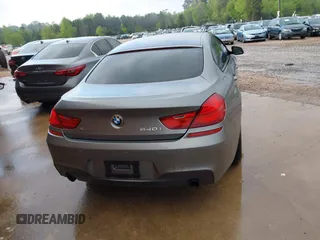 2016 BMW 6 Series 640i xDrive with VIN WBA6D2C58GGT66160, listed as a IAAI auction lot 41130666 with 102,064 mi miles and . Bid and sale history available at carsss.com. Image 17.