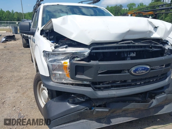 2018 Ford F-150 XL with VIN 1FTEX1CB5JFE55932, listed as a IAAI auction lot 42298917 with 143,923 mi miles and . Bid and sale history available at DreamBid. Image 17.